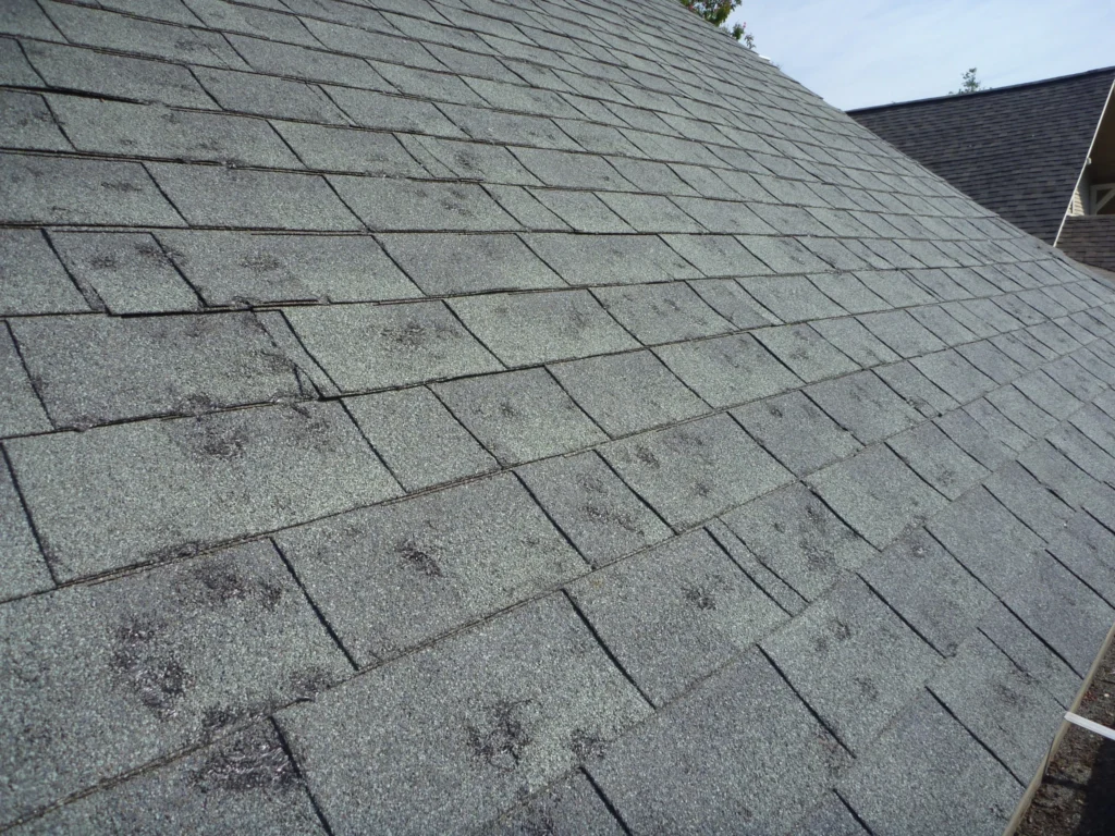 Hail damage on asphalt shingles