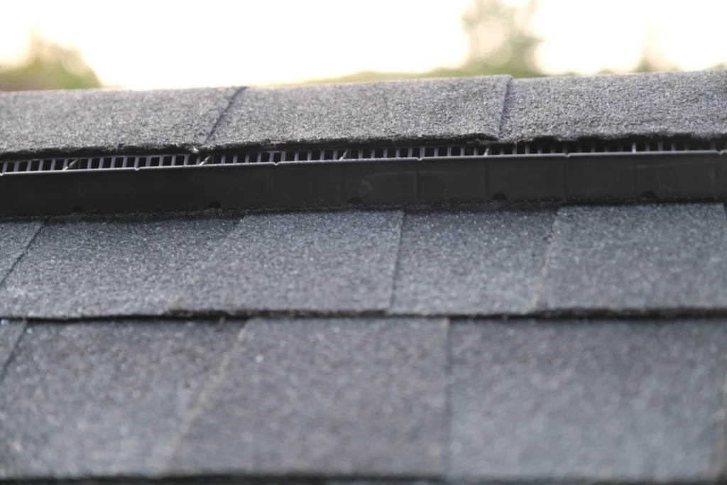 close-up photo of a ridge vent installed along a roof peak